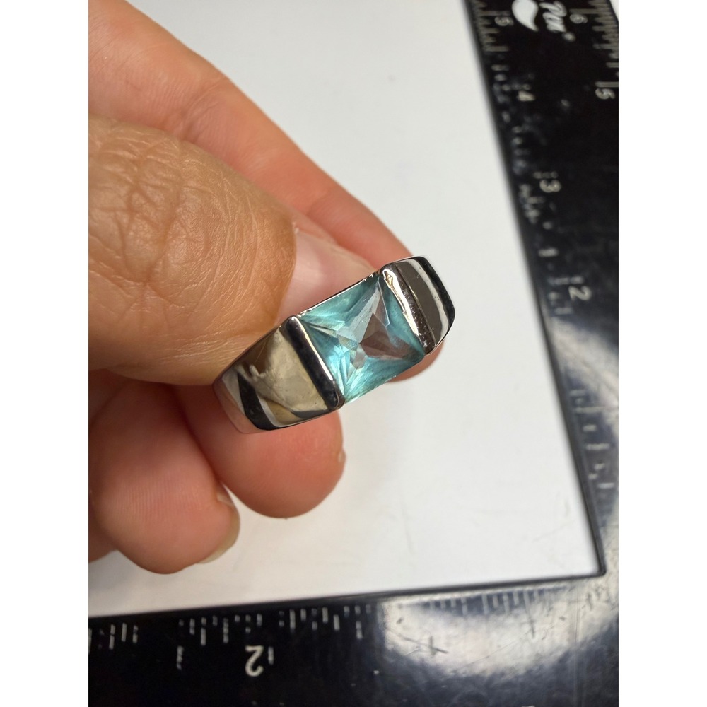 Silver Tone Princess Cut Light Blue Stone Tension Set Wide Band Ring Size 11.25